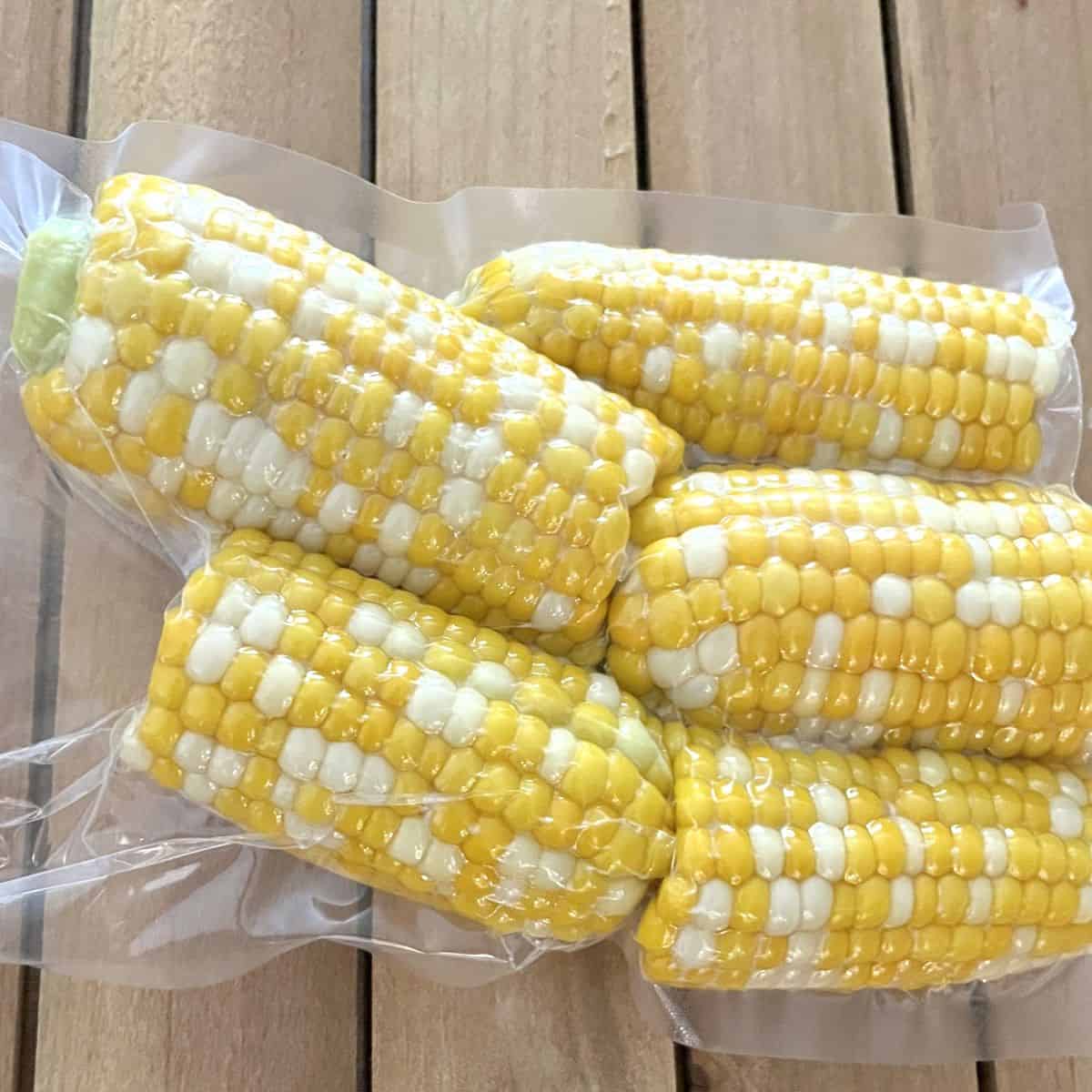 corn on the cob in a vacuum sealed bag ready for the freezer